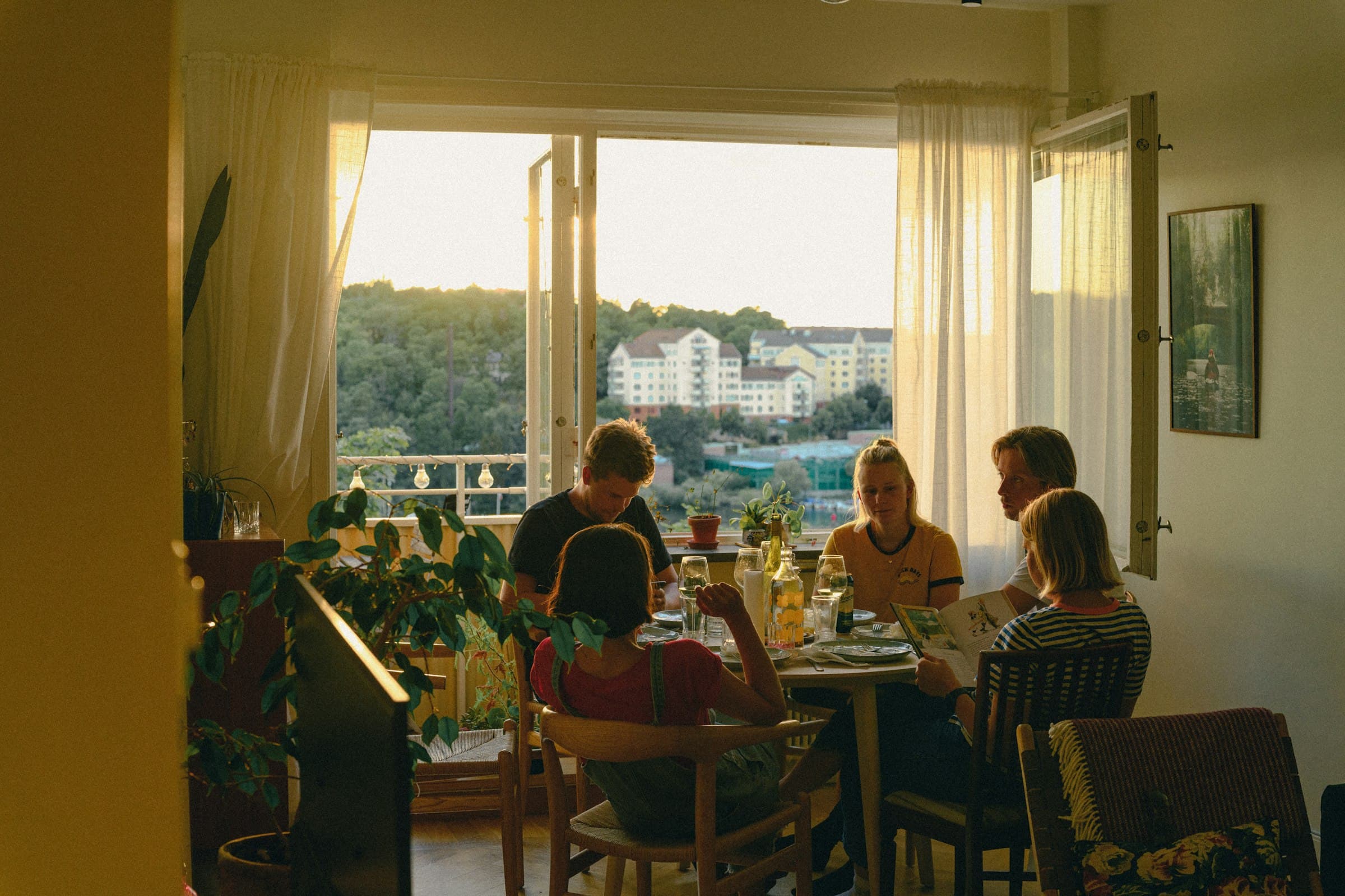 Friends sitting together around a table